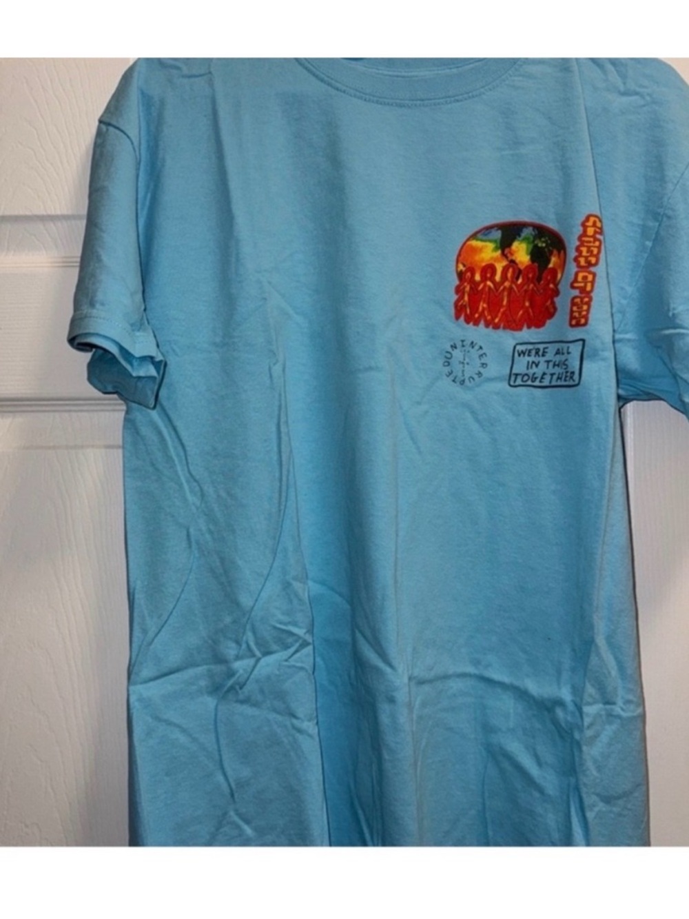 Cactus Jack by Travis Scott Light Blue Graphic Tee with Multi-Color Print